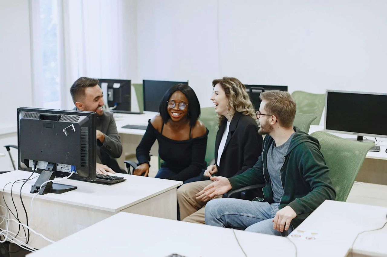 4 people at a business event.