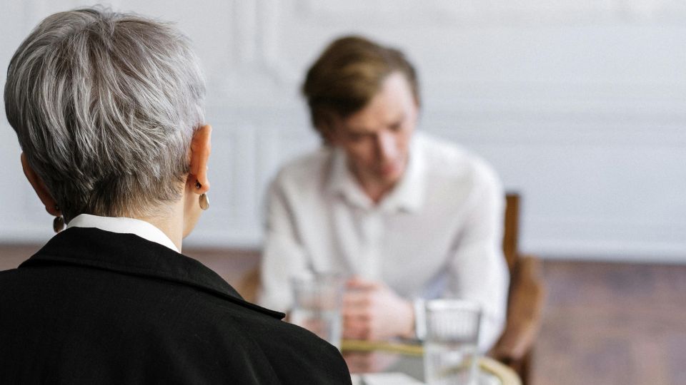 a man and a woman having a conversation